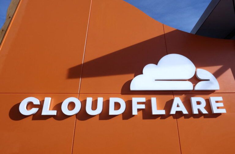 A logo of CLOUDFLARE sits at the WEF in Davos